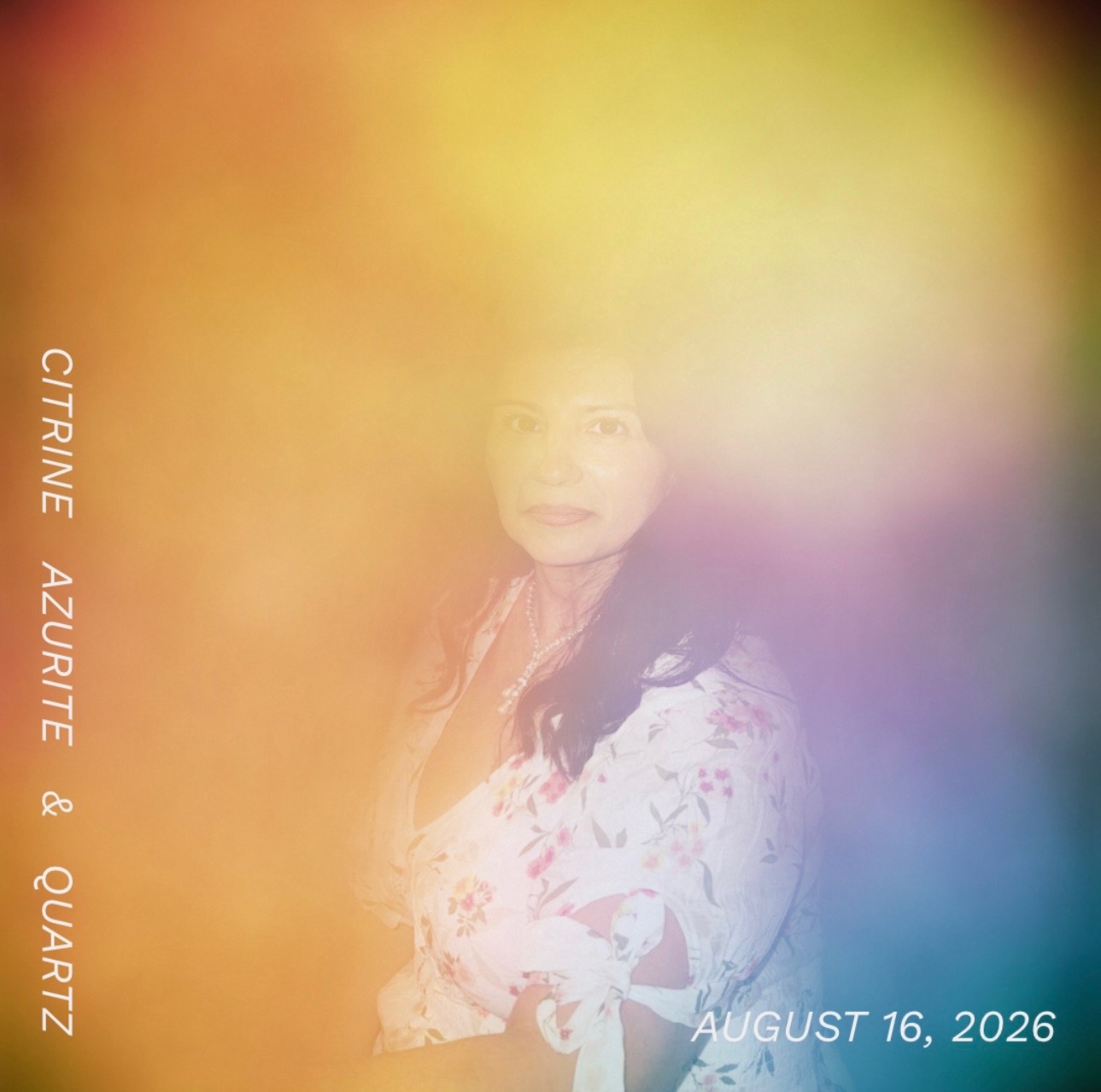 Aura photograph of Selma Sol surrounded by citrine gold, rose and azure light